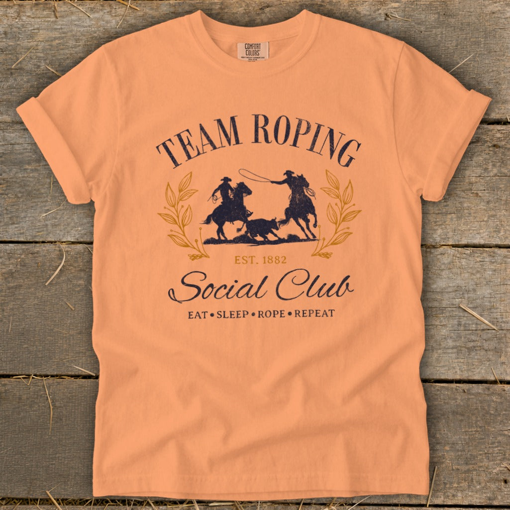 Team Roping Social Club t-shirt with cowboys, dog, and text.