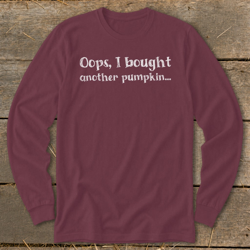Burgundy long-sleeve t-shirt with white text "Oops, I bought another pumpkin..."