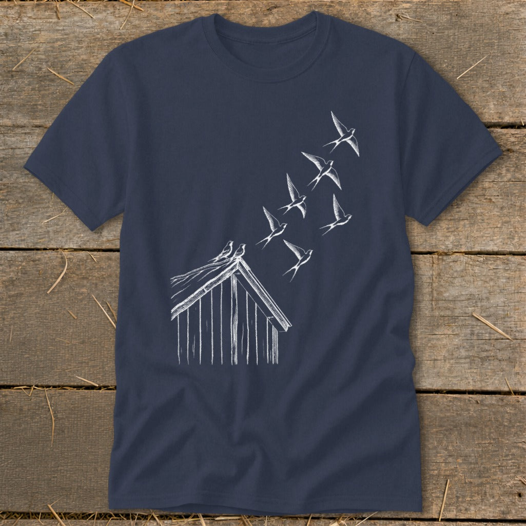 Dark blue crewneck t-shirt featuring a white line drawing of birds flying from a barn roof.