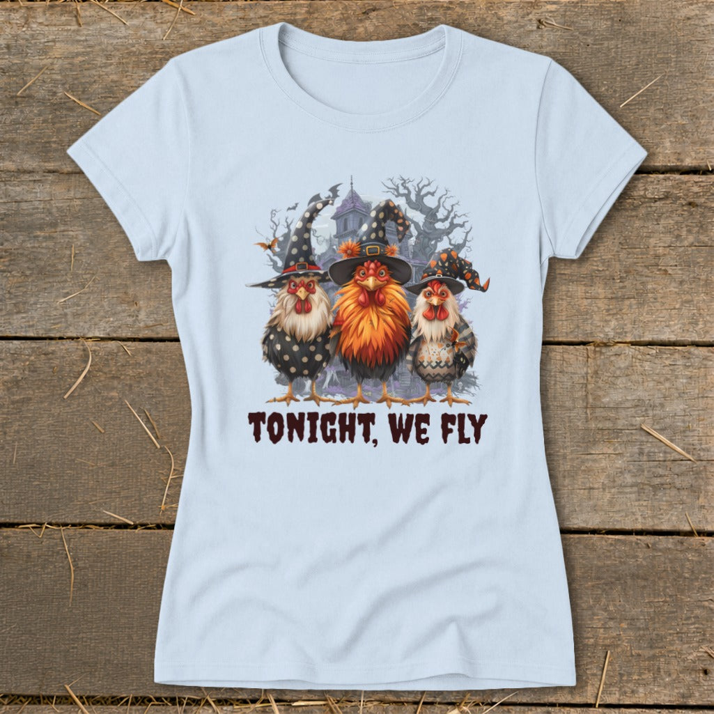 Three chickens in witch hats with "TONIGHT, WE FLY" text.