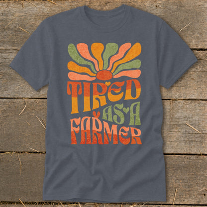 Dark grey t-shirt with retro "Tired as a Farmer" graphic.