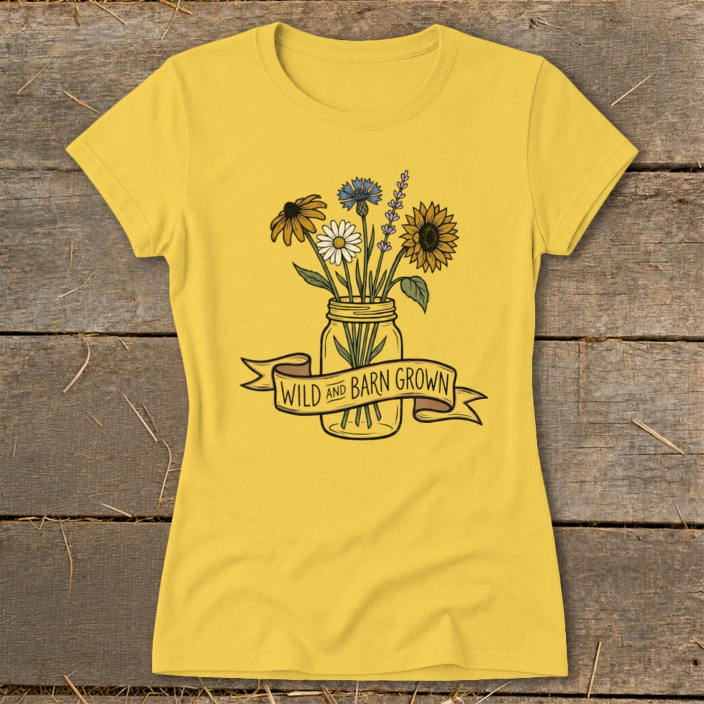 Yellow t-shirt with floral mason jar graphic and "WILD AND BARN GROWN" banner.