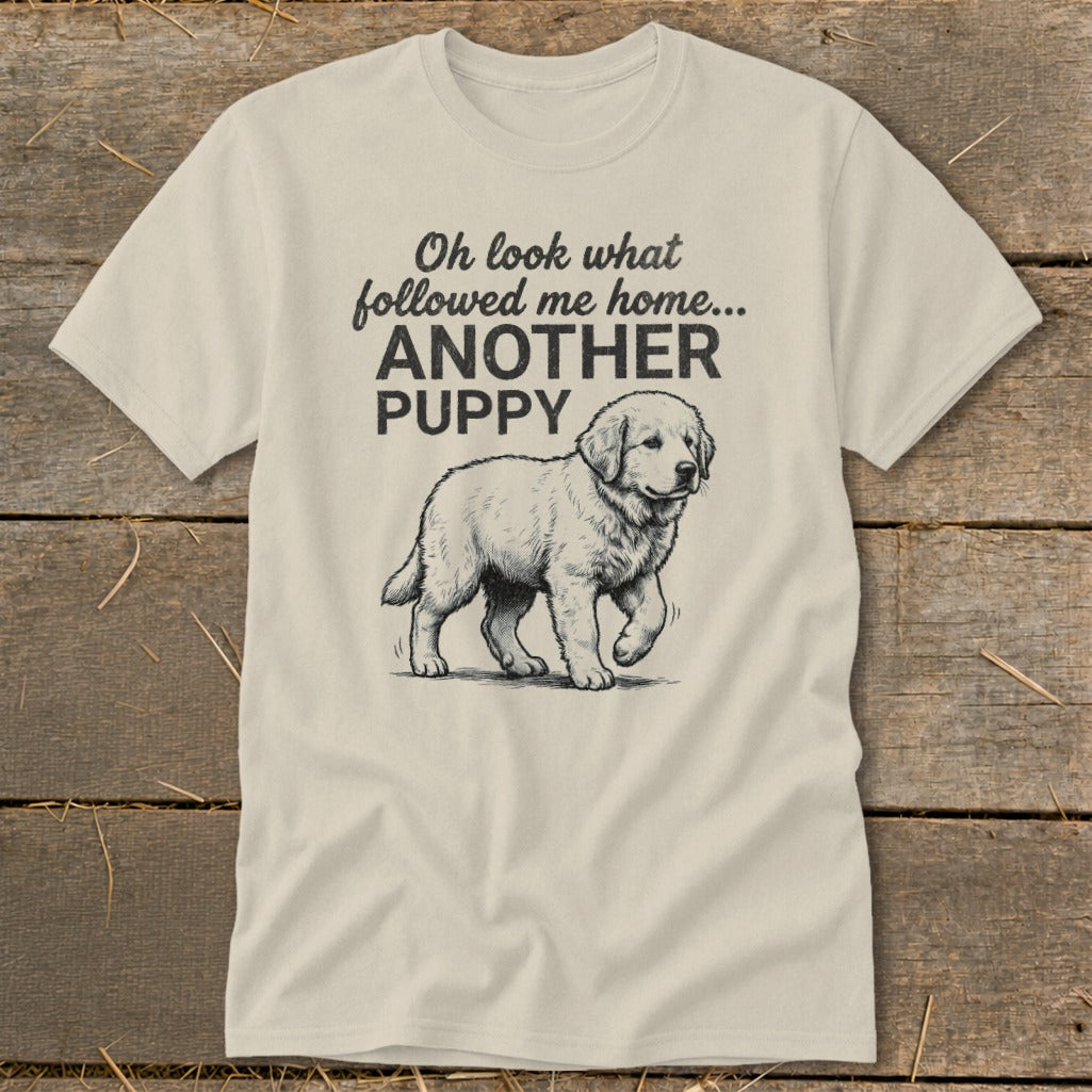 Cream t-shirt with black graphic: "Oh look what followed me home... ANOTHER PUPPY" and a drawing of a puppy.