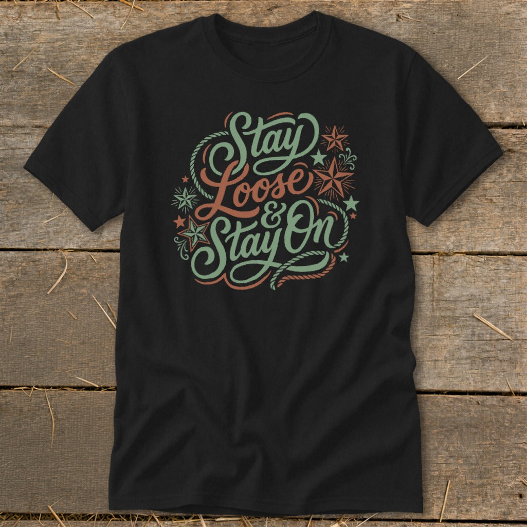Black t-shirt with "Stay Loose & Stay On" text and western-style design.