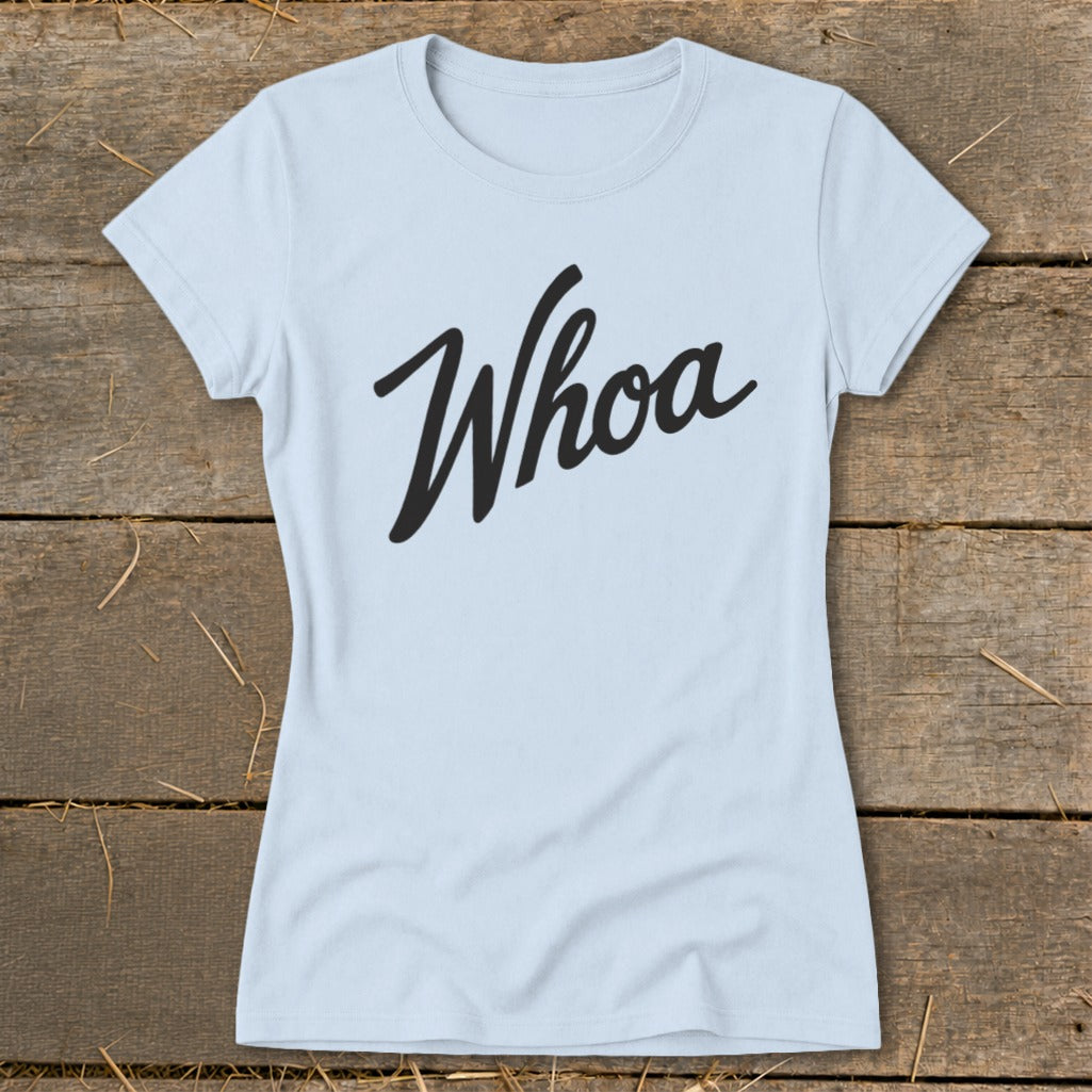 Light blue t-shirt with black "Whoa" text in cursive script.