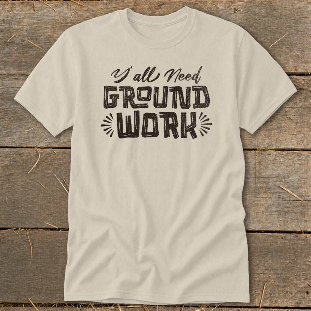 Cream t-shirt with "Y'all Need GROUND WORK" text.