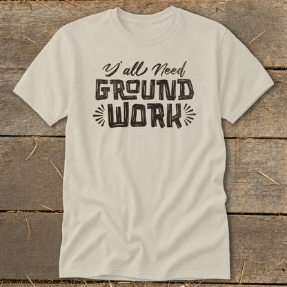 Cream t-shirt with "Y'all Need GROUND WORK" text.