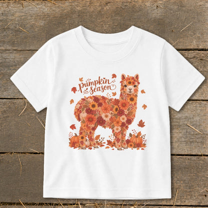 White t-shirt with a floral alpaca graphic and "pumpkin season" text.