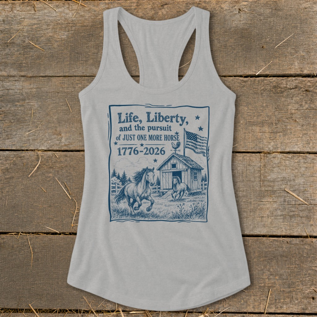 Light grey tank top with "Life, Liberty, and the pursuit of JUST ONE MORE HORSE 1776-2026" graphic.