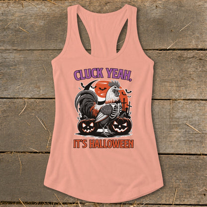 Peach tank top with skeleton rooster, pumpkins, and text "CLUCK YEAH, IT'S HALLOWEEN".