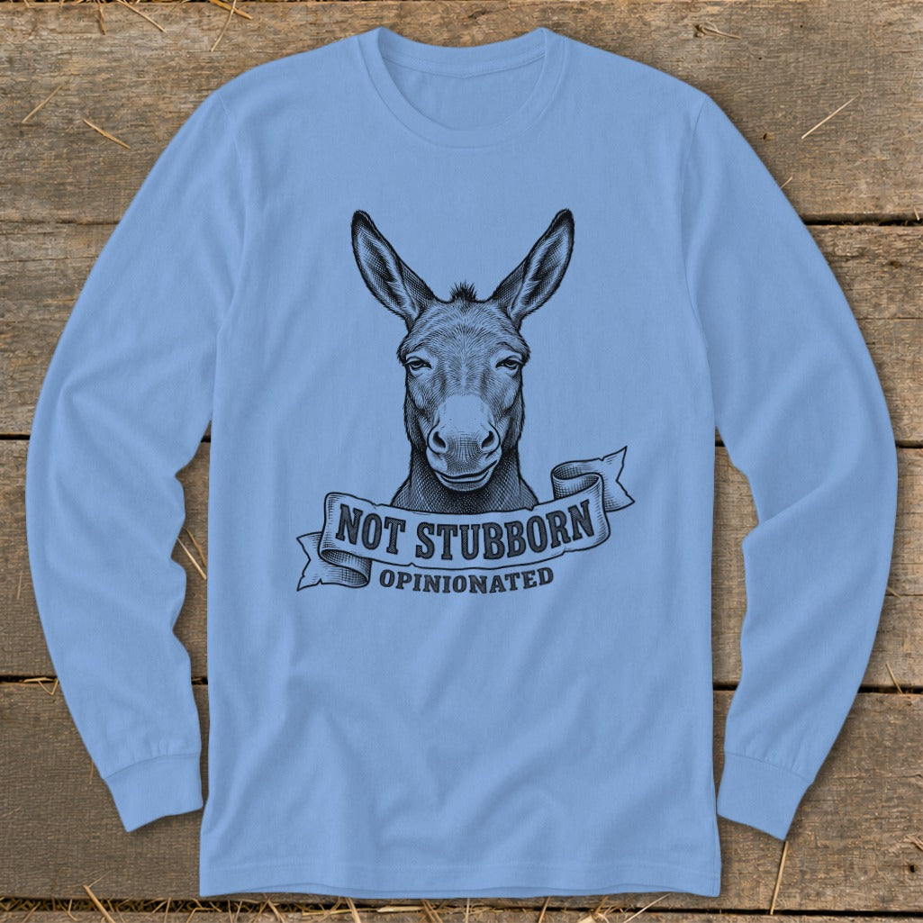 Light blue long sleeve shirt with a sketch of a donkey and text "NOT STUBBORN OPINIONATED".