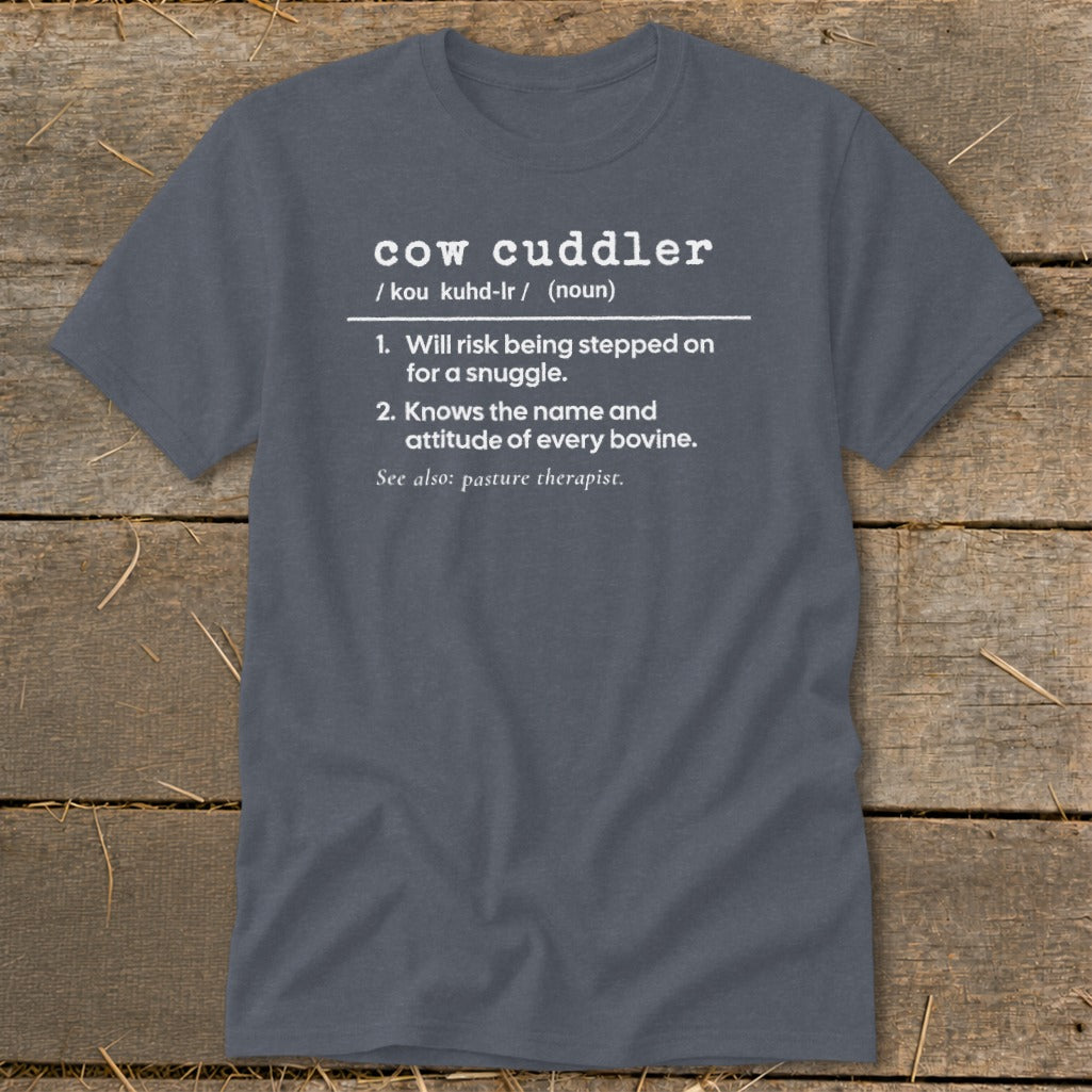 Gray t-shirt with white text defining "cow cuddler" and "pasture therapist."