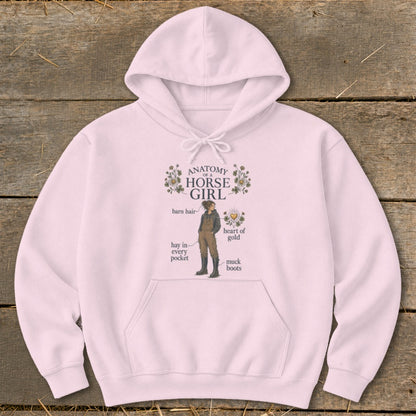 Pink hoodie with "Anatomy of a Horse Girl" text and illustrative diagram.