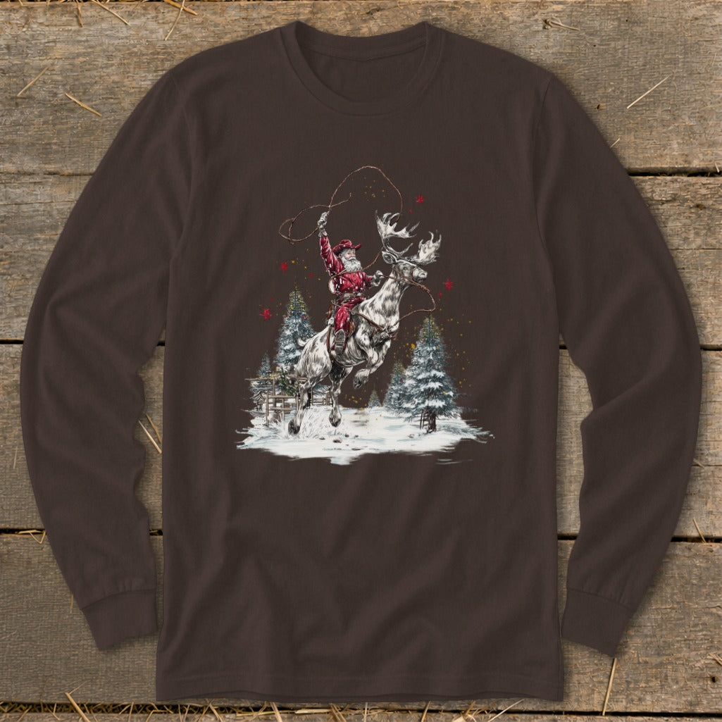 Santa rides a moose while swinging a lasso in a snowy forest.