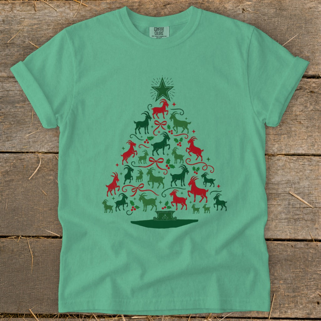 Green t-shirt with a Christmas tree made of red and green goats.