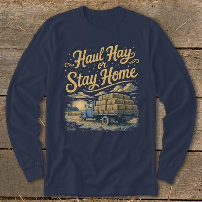 Long-sleeve shirt with "Haul Hay or Stay Home" text over a truck loaded with hay bales.
