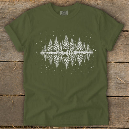 Olive green t-shirt with white pine trees, reflection, and a subtle chicken graphic.