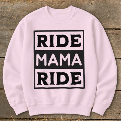 Pink crewneck sweatshirt with black text "RIDE MAMA RIDE" in a box.