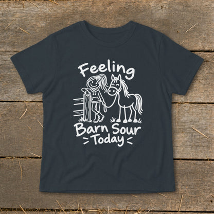 Dark gray t-shirt with white text and illustration of a girl and horse saying "Feeling Barn Sour Today".