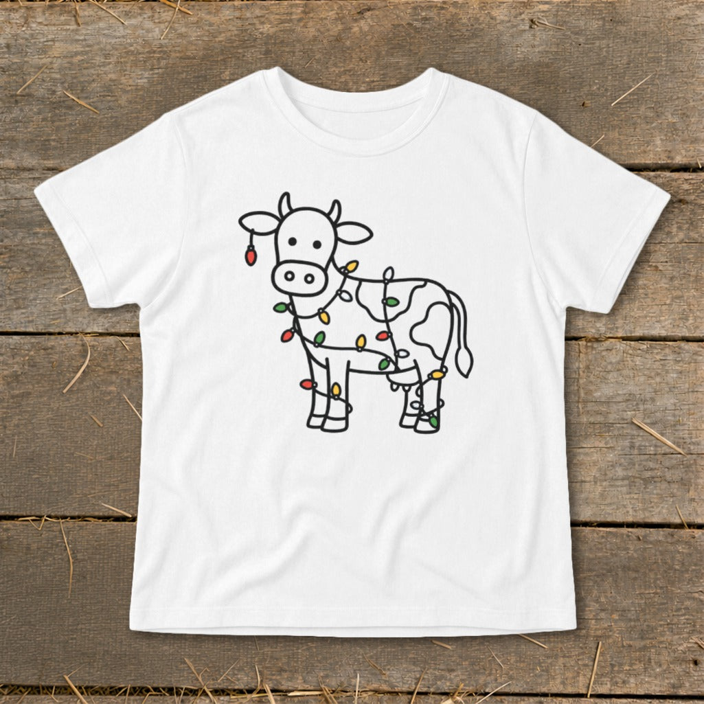 White t-shirt with a cartoon cow outline adorned with colorful Christmas lights.
