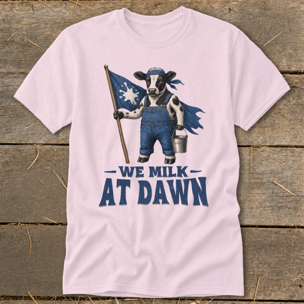 Cow with bandana, cape, overalls, milk pail, holding flag. Text: We Milk At Dawn.