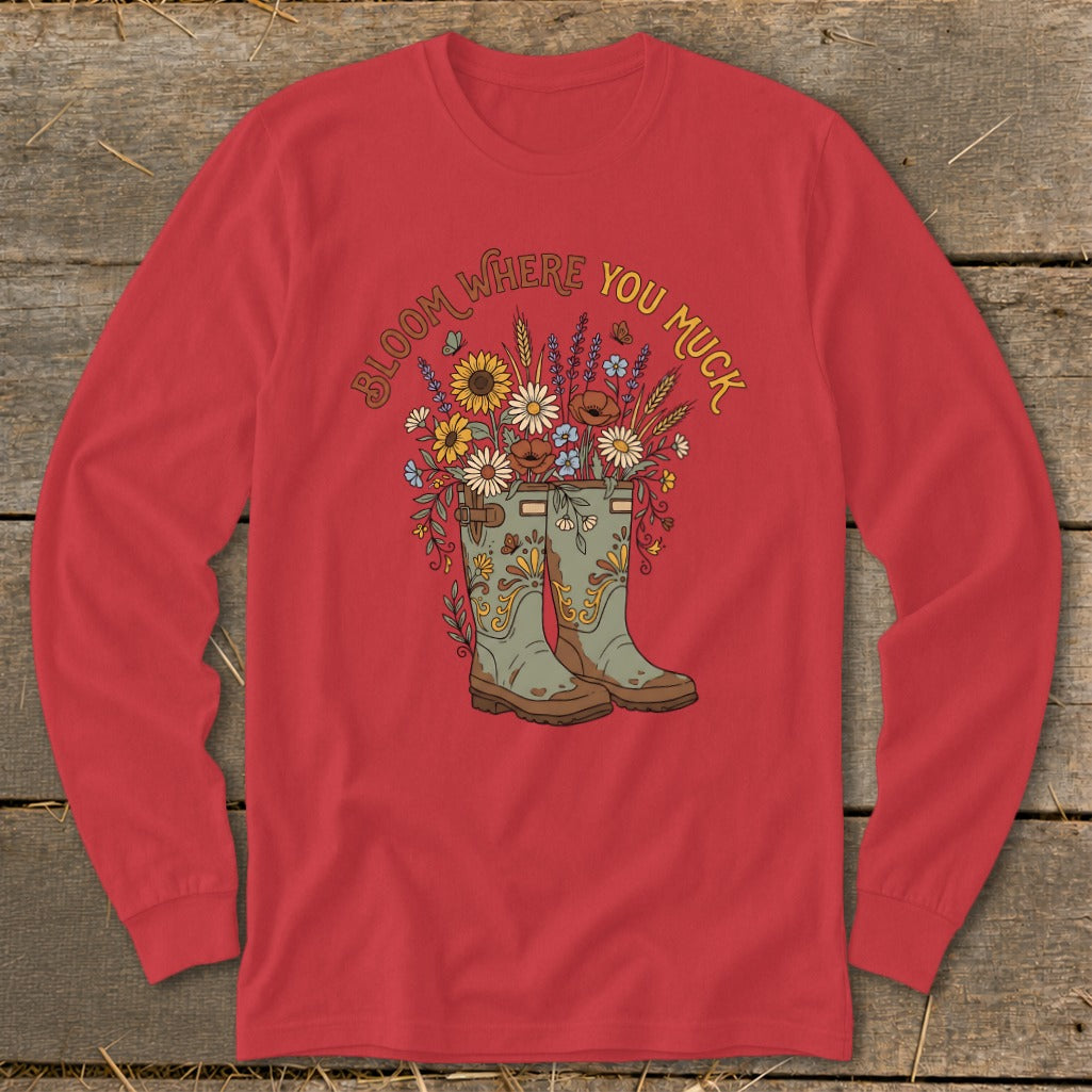 Red long-sleeve shirt with floral design and "Bloom Where You Muck" text.