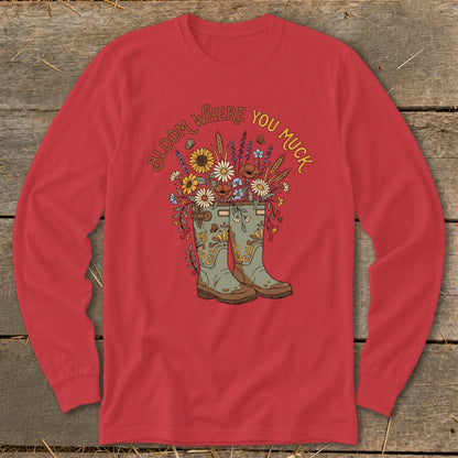 Red long-sleeve shirt with floral design and "Bloom Where You Muck" text.