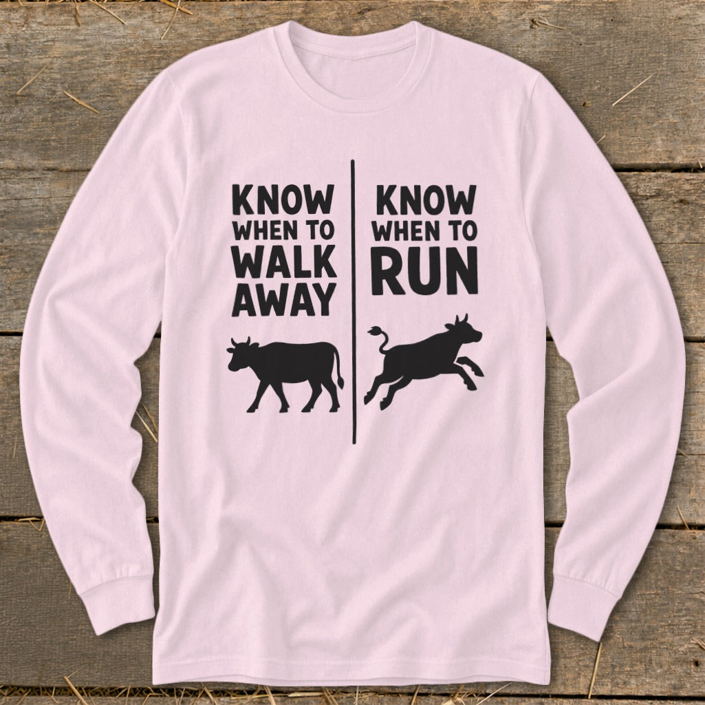 Pink long sleeve shirt with text "Know When To Walk Away" and "Know When To Run"