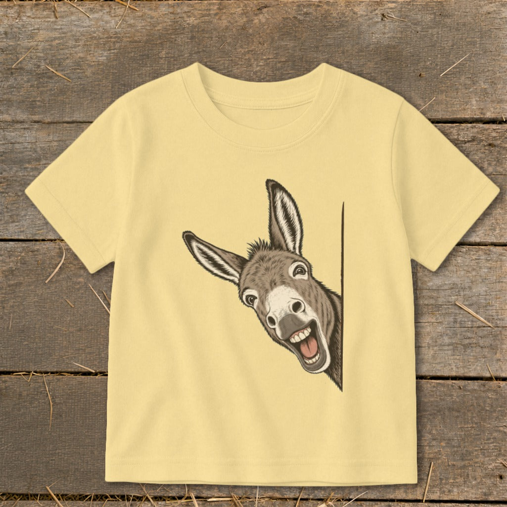 Yellow t-shirt with a surprised donkey peeking around the corner.