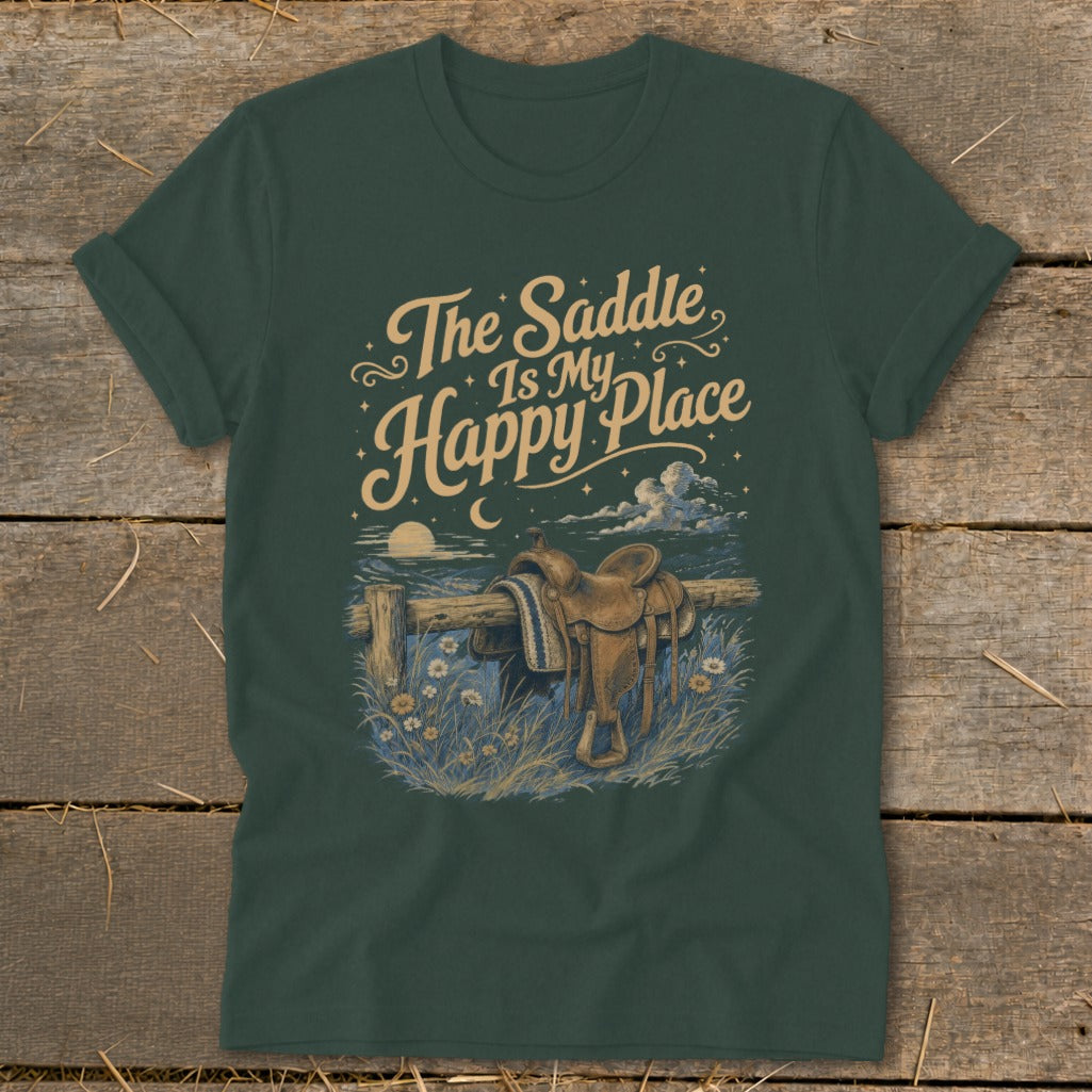 Dark green t-shirt with "The Saddle Is My Happy Place" text and a saddle on a fence.
