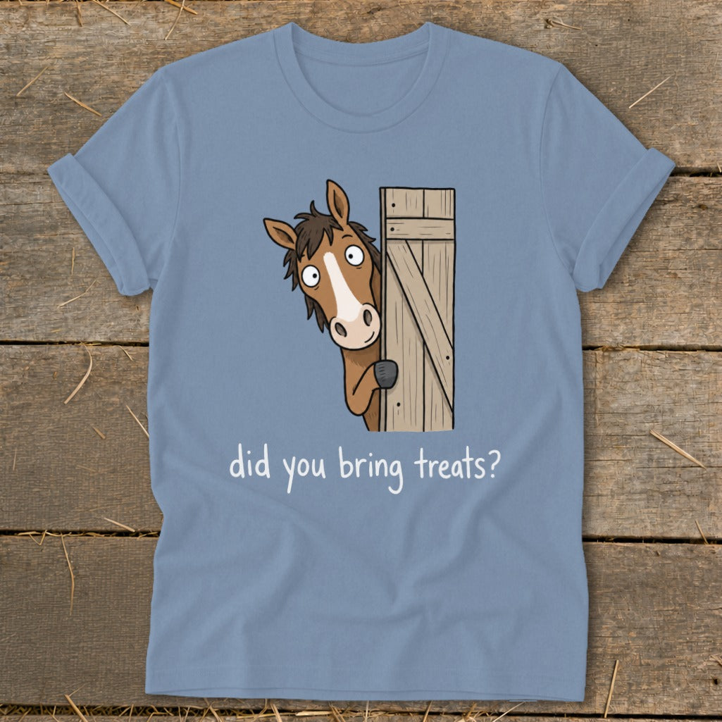 Blue t-shirt with cartoon horse peeking from behind a wooden door asking "did you bring treats?".