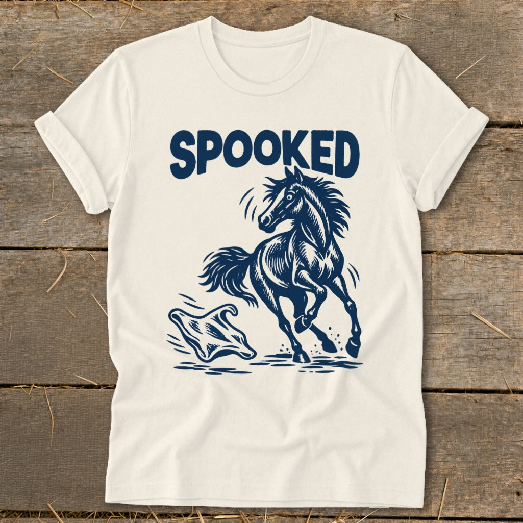Cream t-shirt with a dark blue graphic of a spooked horse and ghost.
