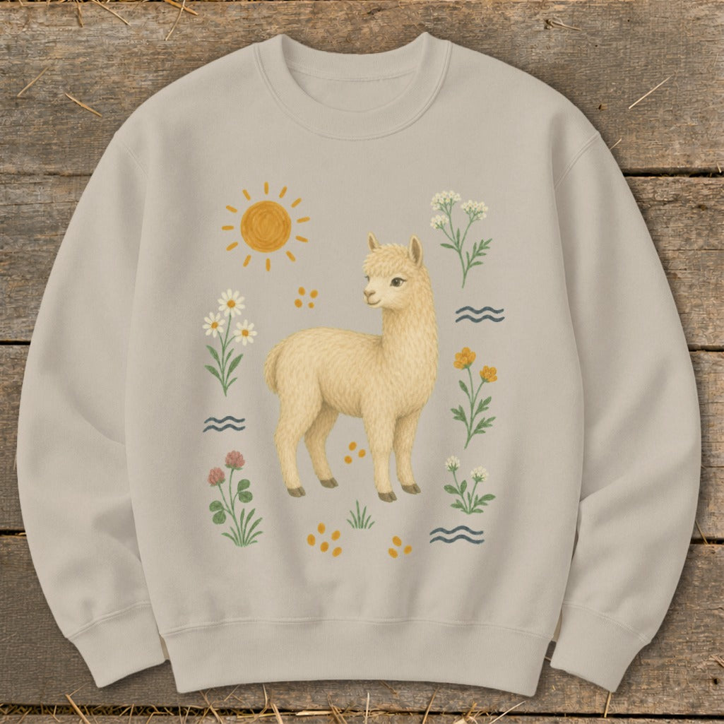 Light beige sweatshirt with a cream-colored alpaca and floral print, sun, and waves.