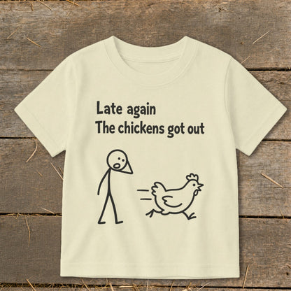 Cream t-shirt with text "Late again The chickens got out" and stick figures.