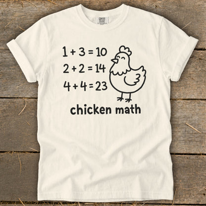 Cream t-shirt with "chicken math" and silly math equations with a chicken graphic.