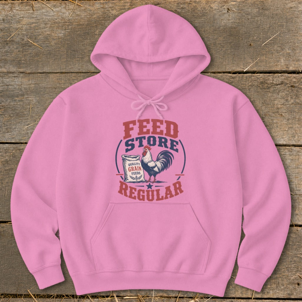 Pink hoodie with "Feed Store Regular" text, a rooster, and a bag of grain.
