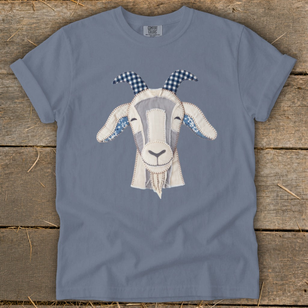 Gray t-shirt with a fabric applique of a goat's head.