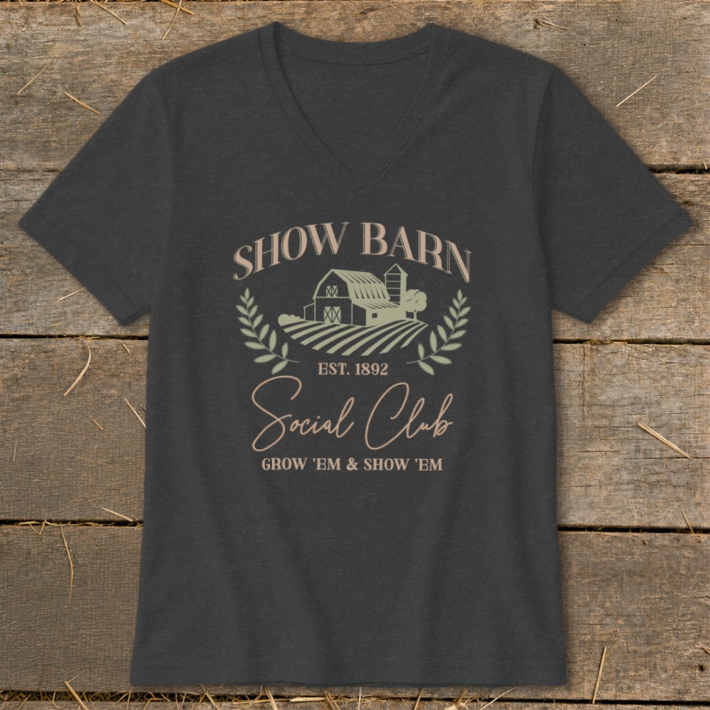 Dark gray v-neck t-shirt with "Show Barn Social Club" graphic and barn illustration.