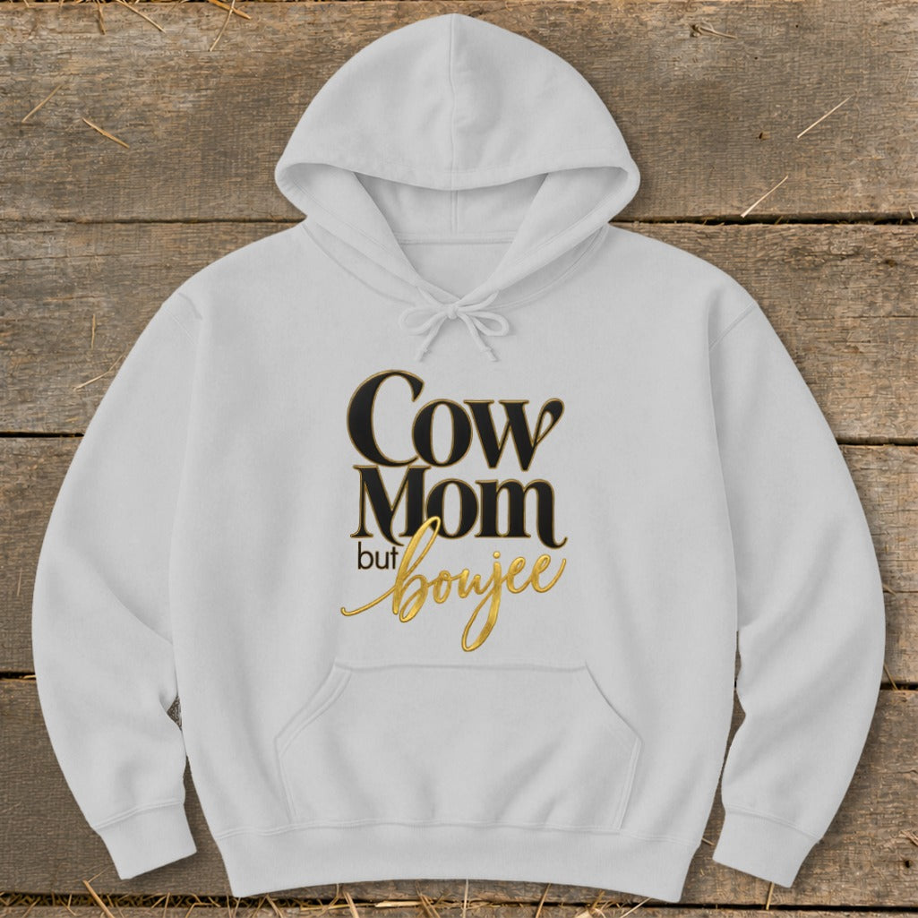 White hoodie with "Cow Mom but boujee" text design.