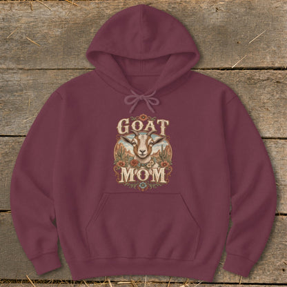 Maroon hoodie with "Goat Mom" graphic featuring a goat head and desert landscape.