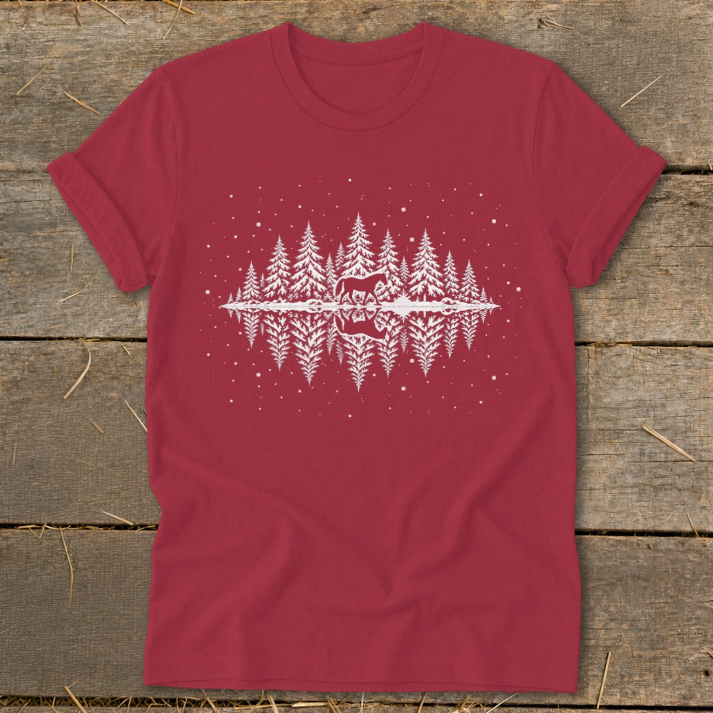 Red t-shirt with white graphic of a horse and pine trees reflected in water.