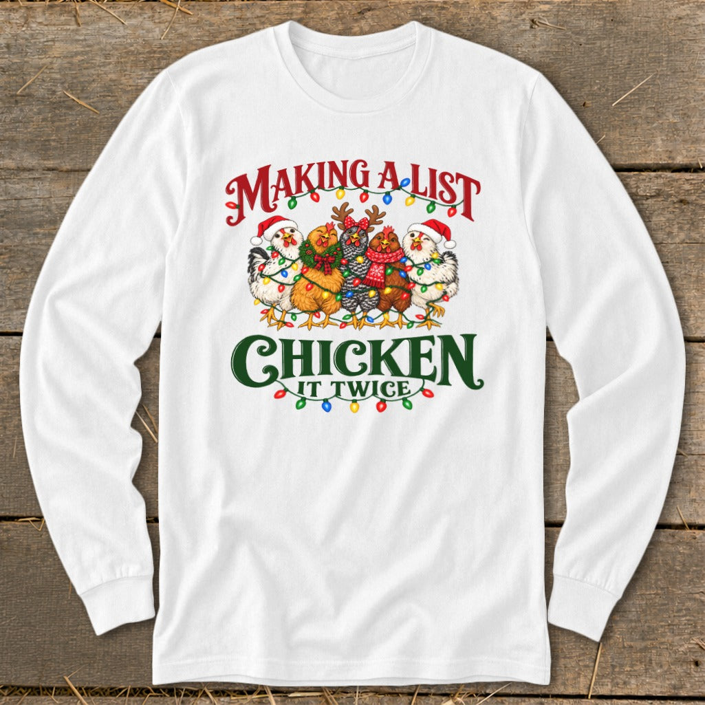 White long sleeve shirt with chickens wearing Santa hats and "Making a list Chicken it twice" text.