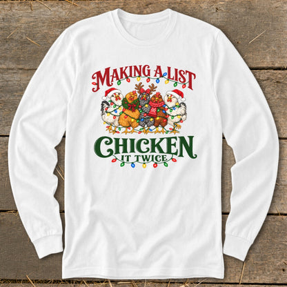 White long sleeve shirt with chickens wearing Santa hats and "Making a list Chicken it twice" text.