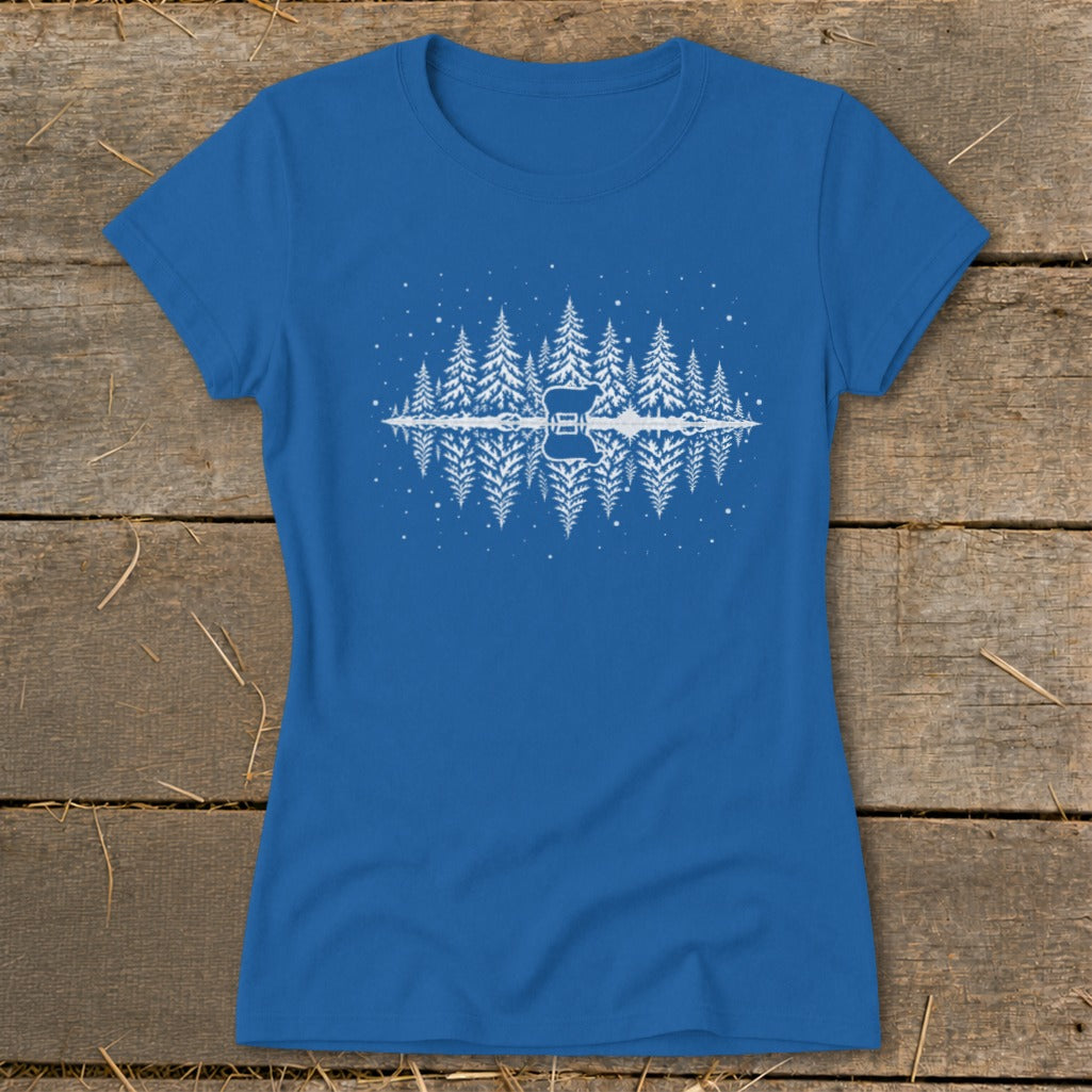Blue t-shirt with white silhouette of pine trees, a deer, and a lake reflection.