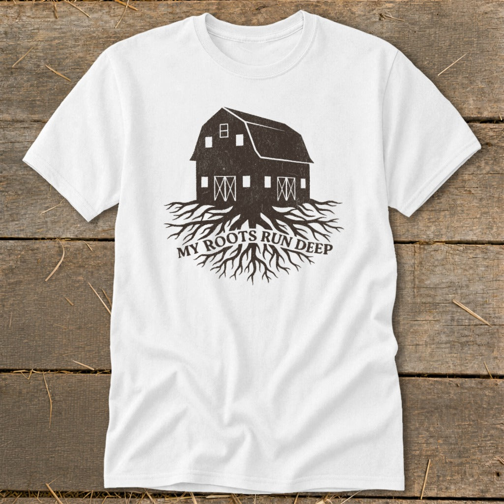 White t-shirt with a barn and roots graphic that reads "My Roots Run Deep".
