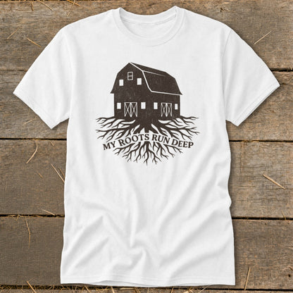 White t-shirt with a barn and roots graphic that reads "My Roots Run Deep".