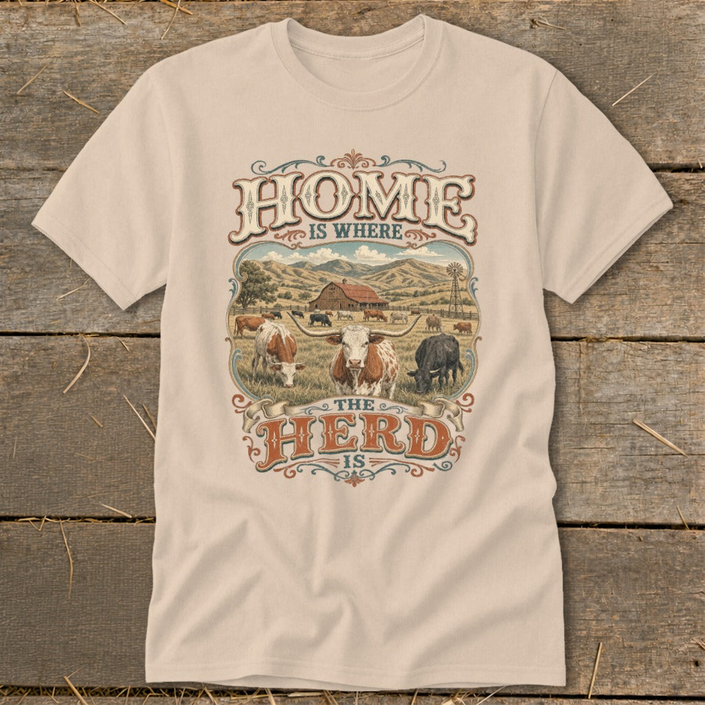 Cream t-shirt with "HOME IS WHERE THE HERD IS" text and farm scene with cows.