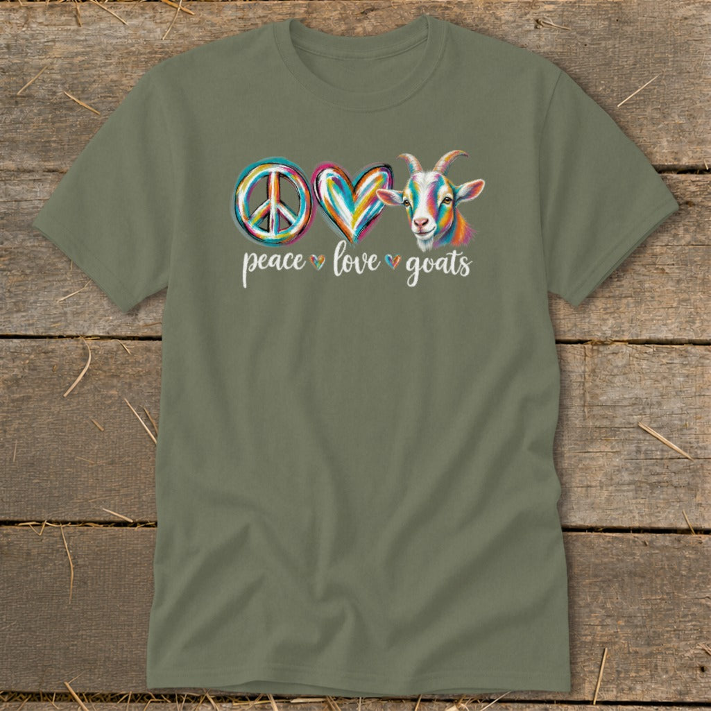 Green t-shirt with a colorful peace sign, heart, and goat graphic with text.