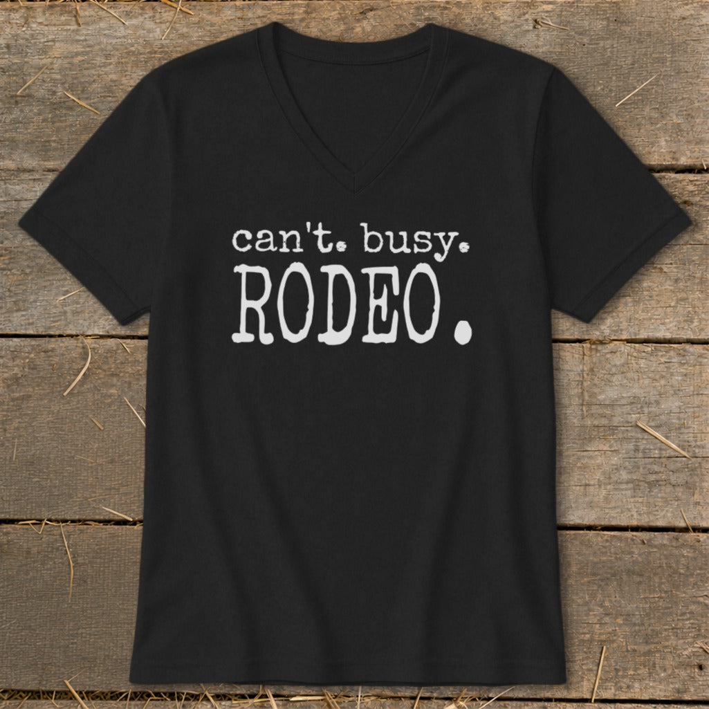 Black v-neck t-shirt with white text: "can't. busy. RODEO."