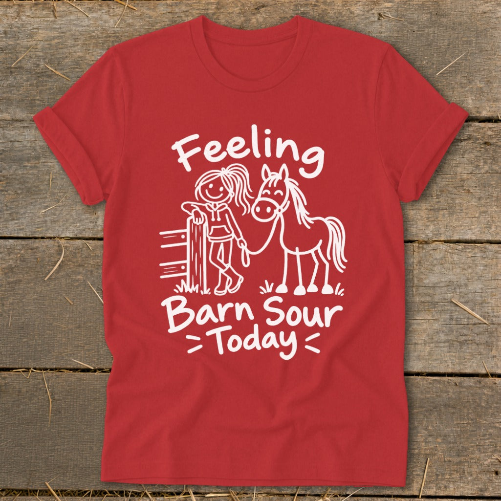 Red t-shirt with white text and drawing of a girl and horse saying "Feeling Barn Sour Today."